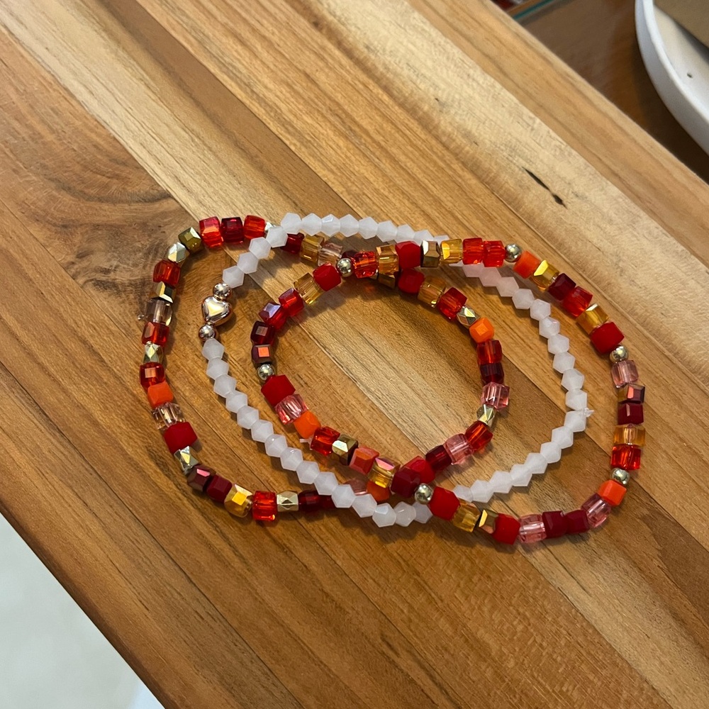 Red and gold bracelet stack ❤️